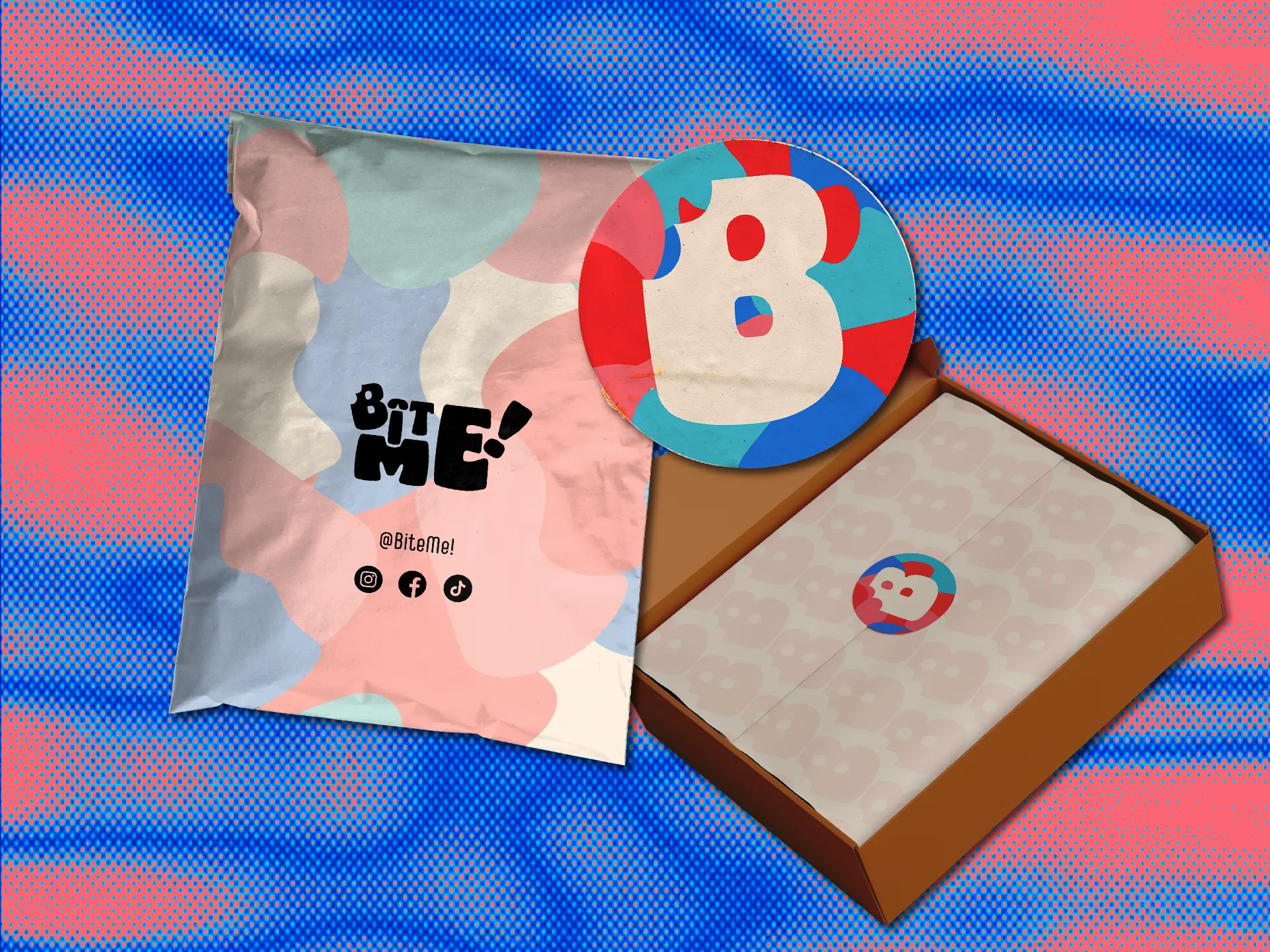 Bite Me! packaging: patterned mailer bag, B sticker and branded box
